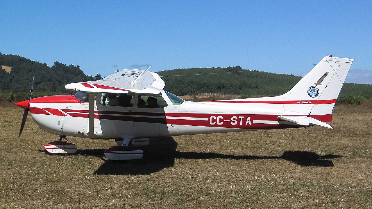Cessna 172 on grass.